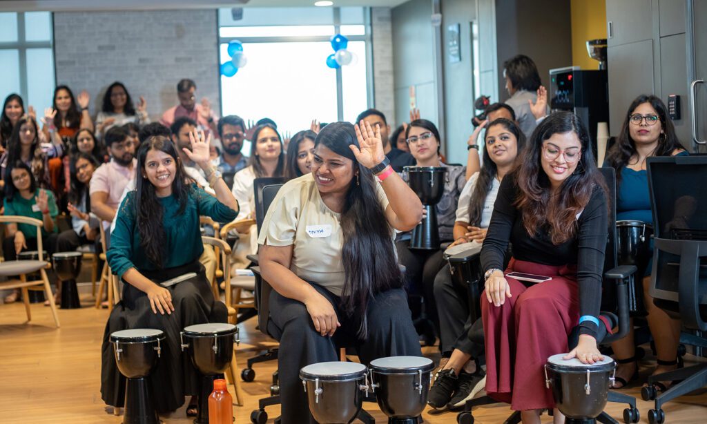 Trinity Gurgaon staff playing drums