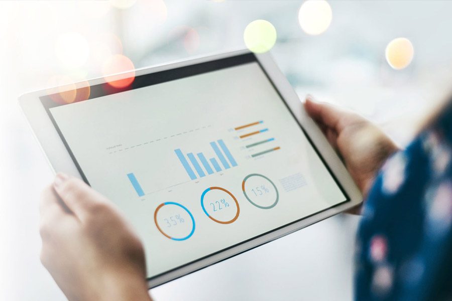 Tablet with chart and data showing.