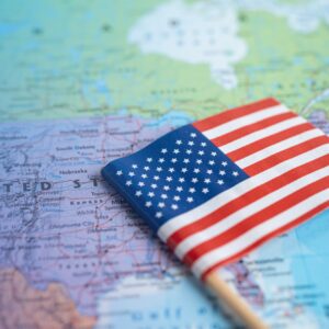 American flag over a United States map