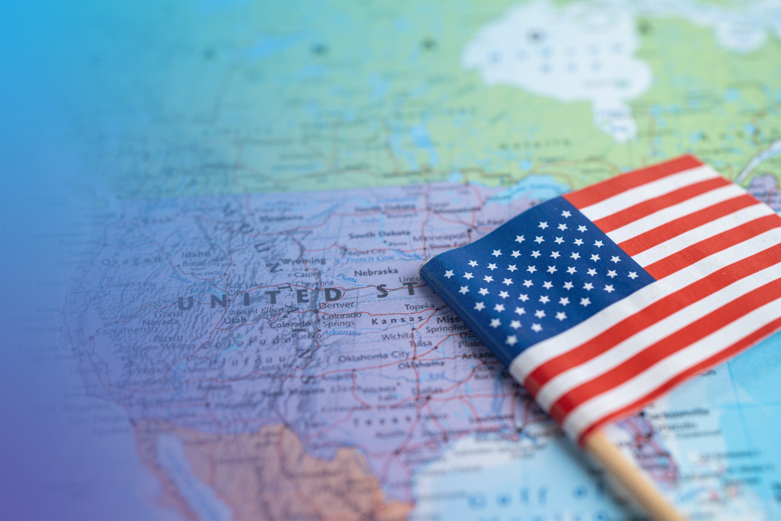 American flag over a United States map
