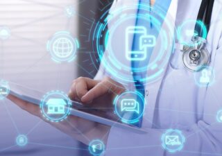 A doctor holding an iPad with omnichannel interconnected icons